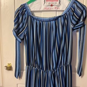 Blue stripes jumpsuit size 4 .  98 % polyester and 2% spandex dry clean